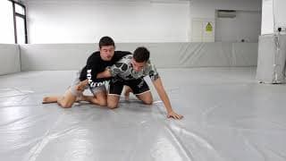 Arm Drag from Bottom Side Control (Dinu Bucalet)